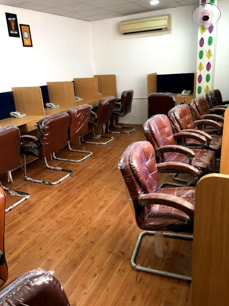 Long rows of desks at The Bloom Co-Work, 7th Floor, A/33 Gandhi Path Road, Jaipur, India.