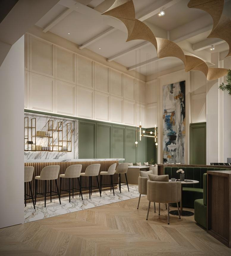 Modern communal cafe and lounge area with marble accents, bar seating, and warm lighting.