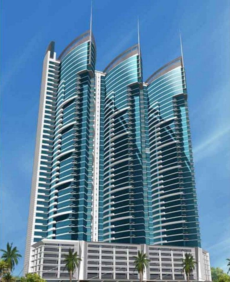 Exterior view of the glass-facade API Tower Al Barsha, Novotel Hotel, Dubai.