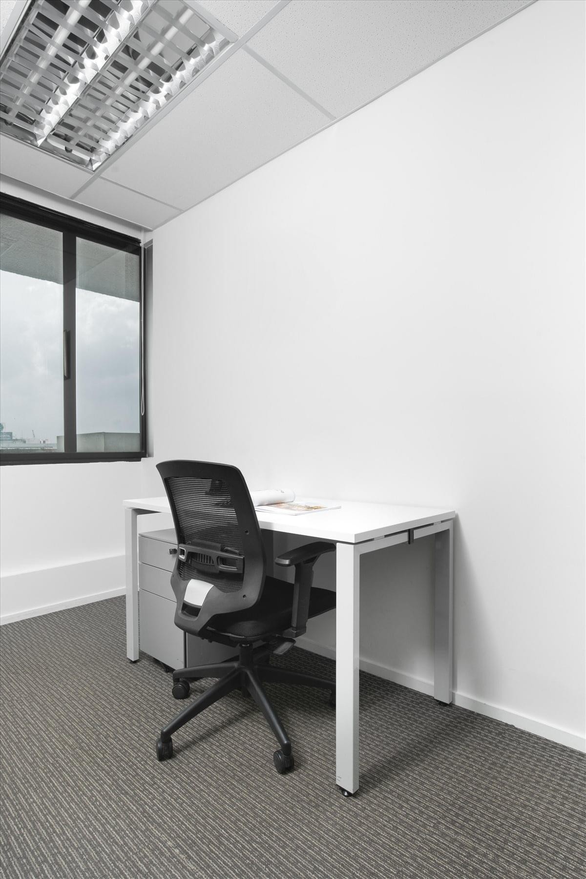 Spacious open-plan workspace at Bangna Tower A (F16) with rows of desks and modern office chairs.