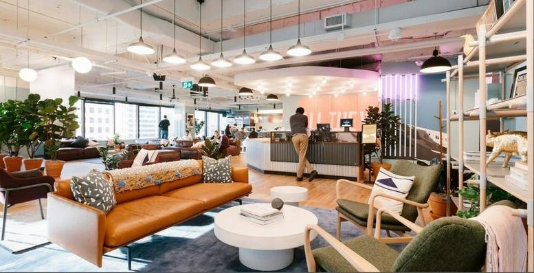 Spacious reception and lounge at Block L, Embassy Tech Village, Outer Ring Road, Bangalore, India with leather sofas.