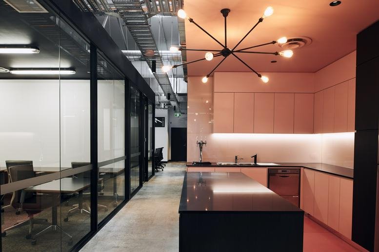 Sleek kitchen and breakout area at Building C, 600 Glenferrie Rd, Hawthorn, Melbourne, Victoria.