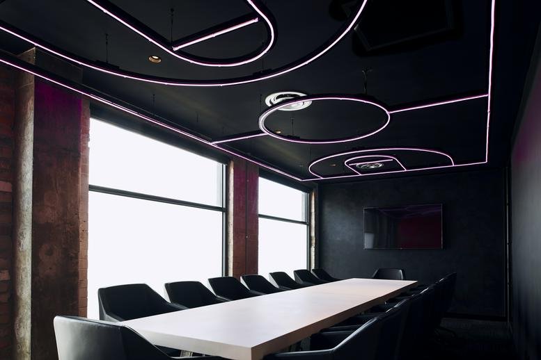 The boardroom at Building C, 600 Glenferrie Rd with a basketball court-themed ceiling.