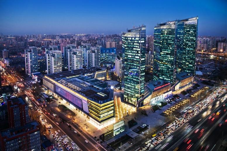 Aerial twilight view of the modern glass-facade towers at China Central Place, 79 Jianguo Road.