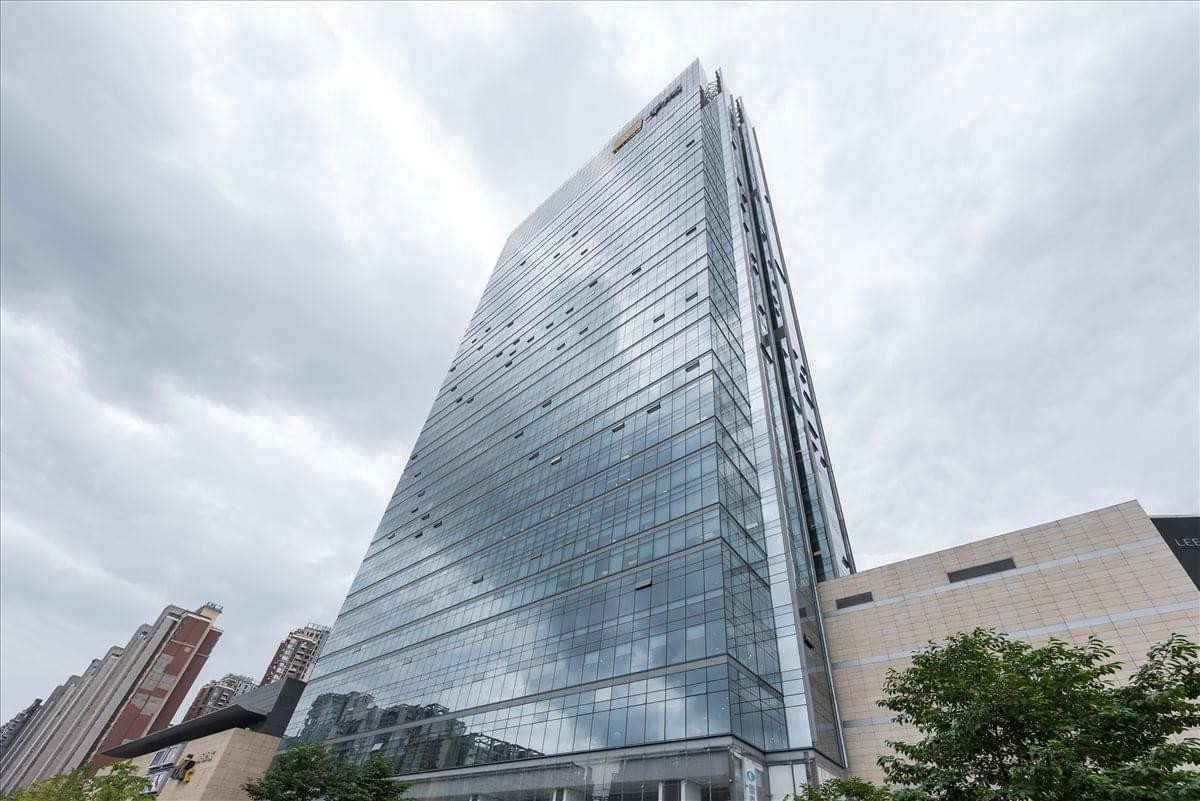 Exterior view of the soaring glass-facade China Resources Building in Chengdu.