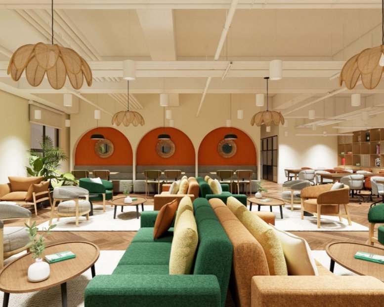 Spacious communal lounge at One Felicity Center with colorful mid-century modern furniture and arched wall features.