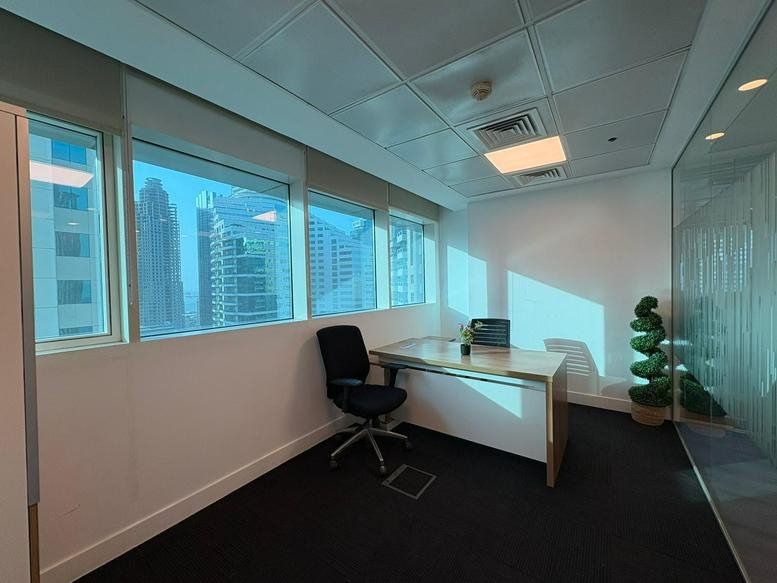 Modern lobby of the Conference Centre, Street 836, West Bay with a marble reception desk.