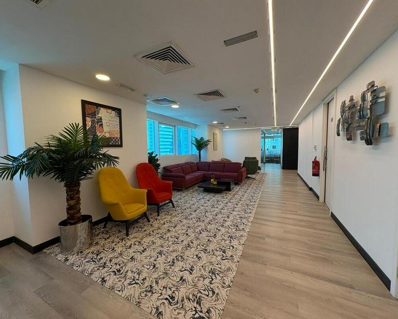 Lounge area at Conference Centre, Street 836, West Bay, Doha, Qatar with colorful armchairs.