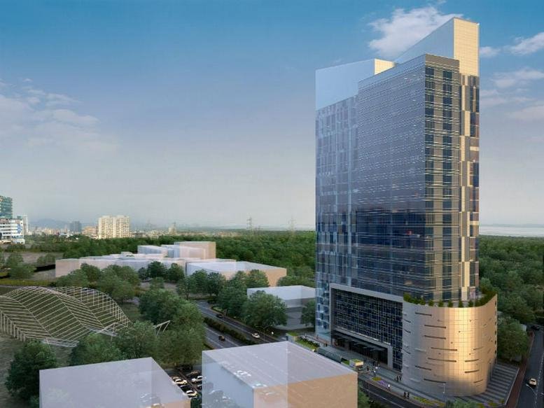 Exterior view of the modern glass-facade Cyber One building in Navi Mumbai.