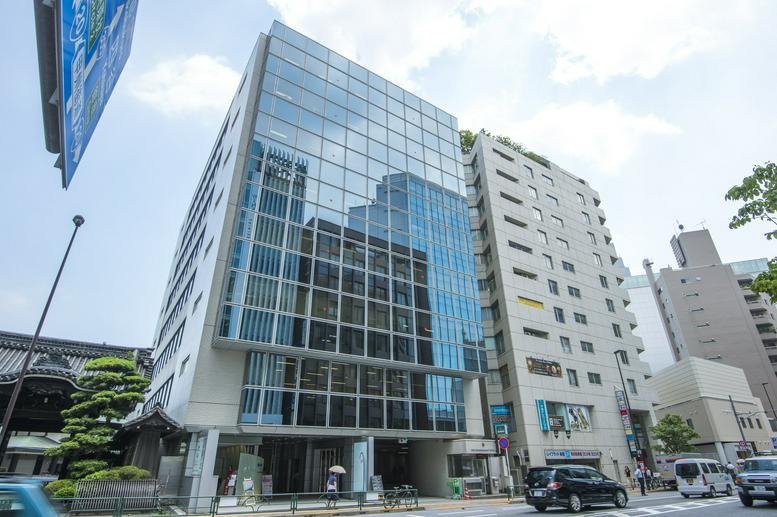 Exterior view of the modern glass-facade Davinci Shinjuku Building.