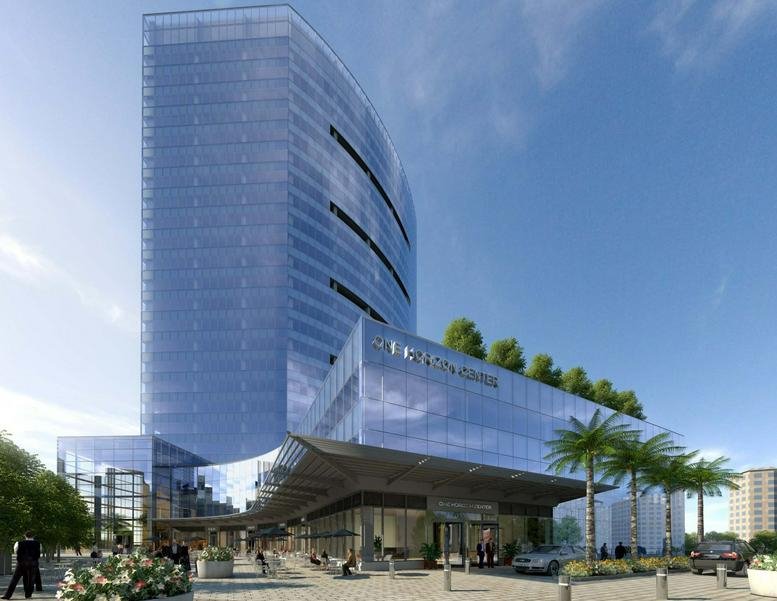 Exterior view of the glass-facade building at DLF Phase 5, Sector 43, Gurgaon, India.