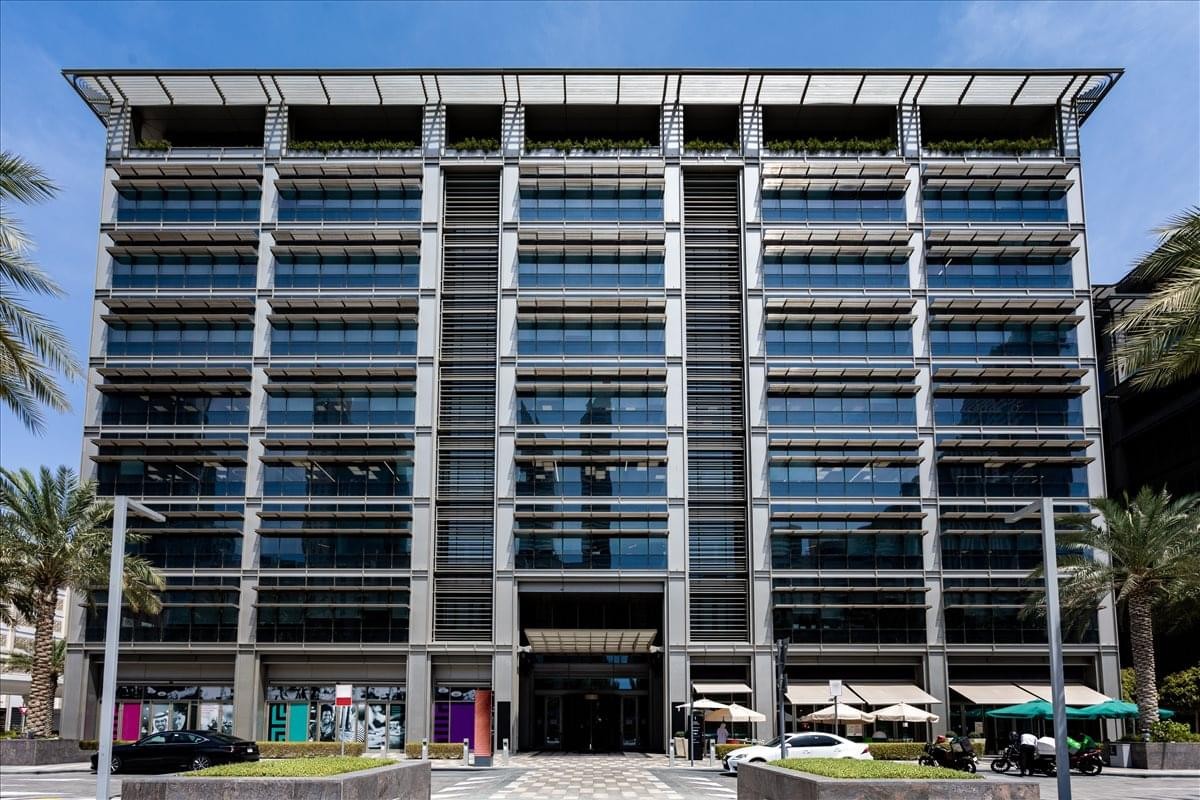 Exterior facade of the C1 Building at Dubai World Trade Center District with modern glass and metal design.