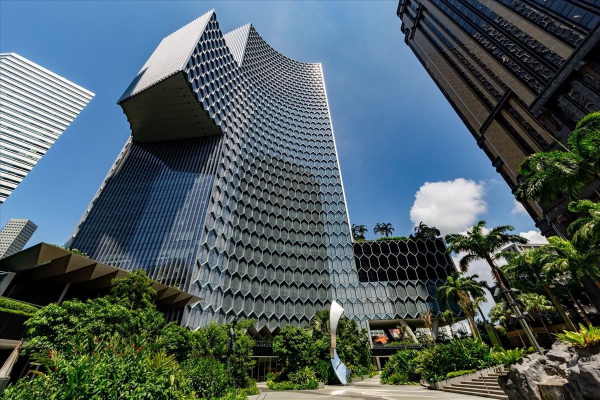 Exterior view of the striking honeycomb-patterned facade of DUO Tower.