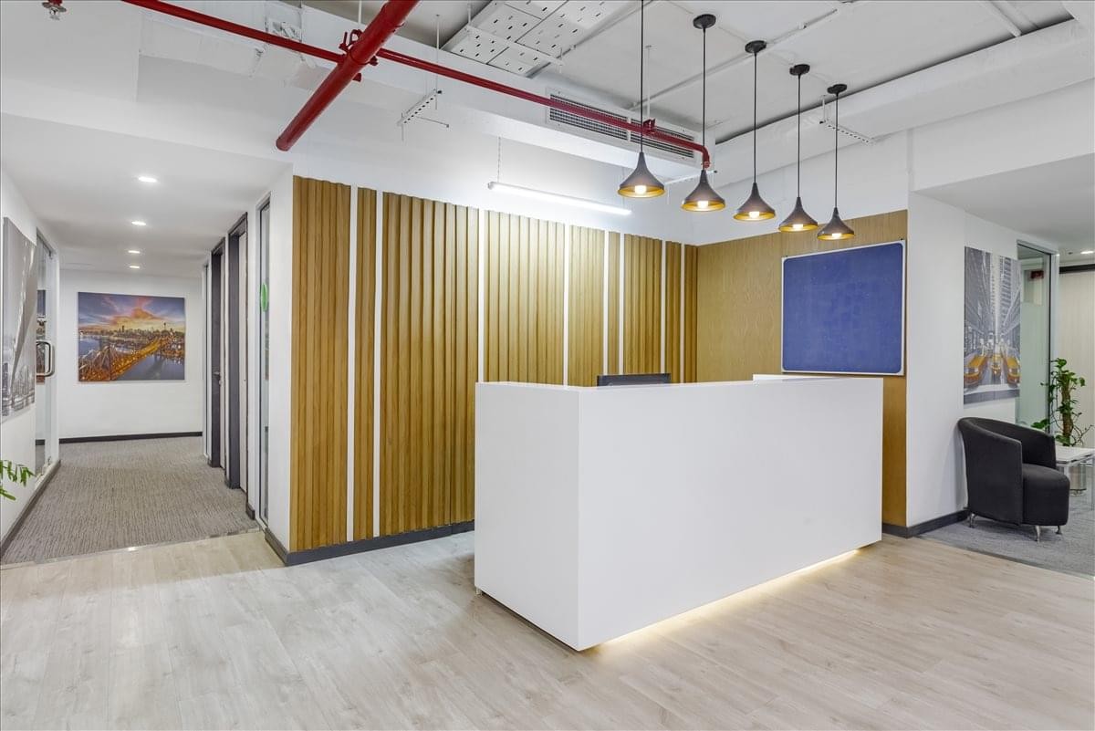 Bright reception desk at Executive Towers Dolmen Mall, 7th Floor, Clifton, Karachi, Pakistan.