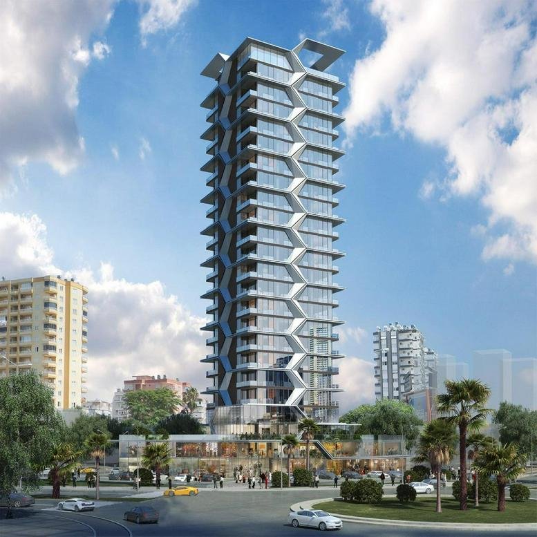 Exterior view of the modern, glass-facade Ekinci Global İş Merkezi Sit. No: 5 building.