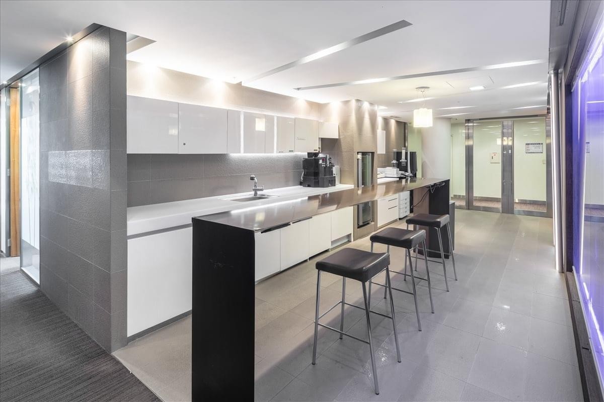 Modern communal kitchen and break area at Gangnam Building, 16th Floor.