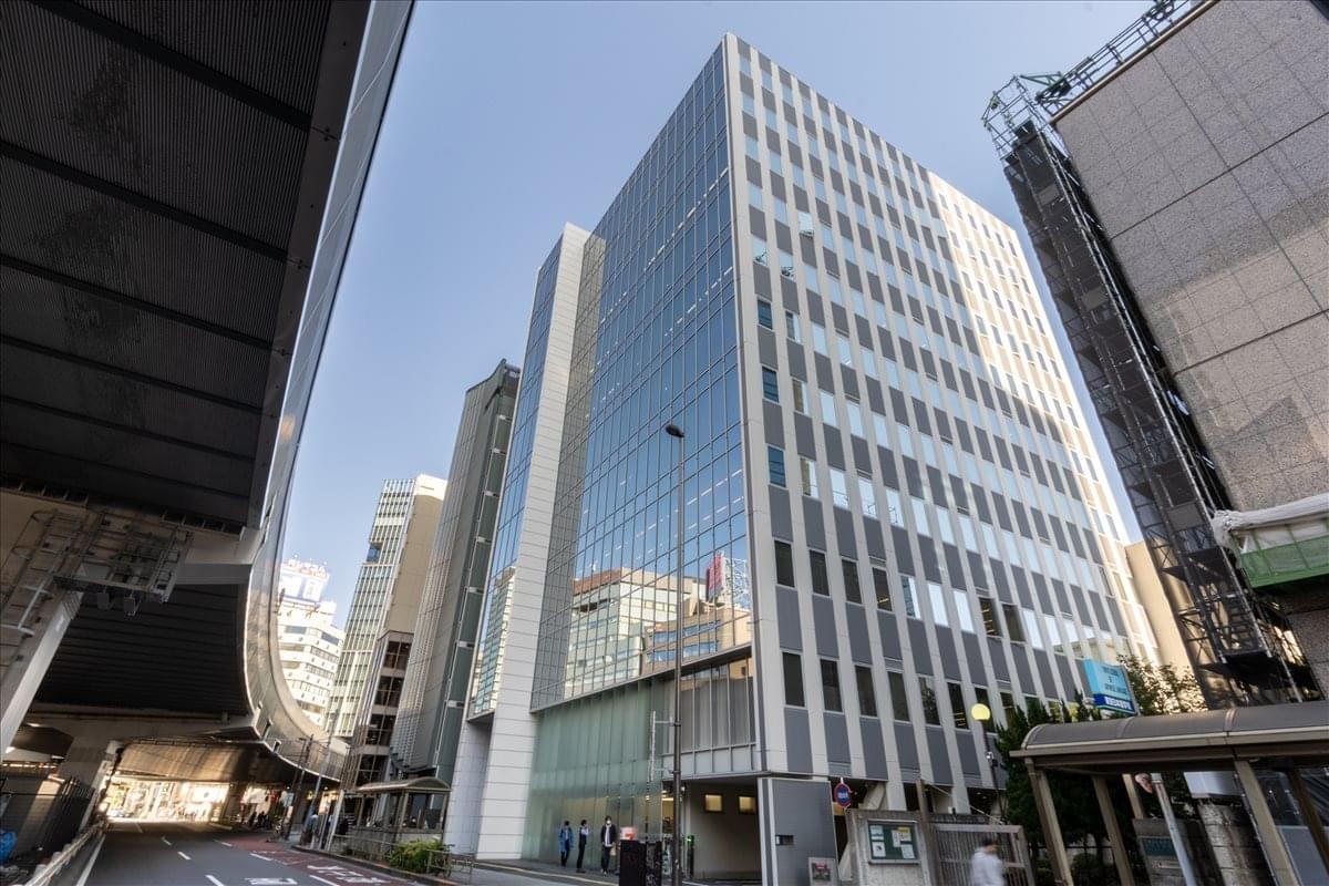 Exterior view of the glass-facade Glass City Shibuya 6th Fl building.