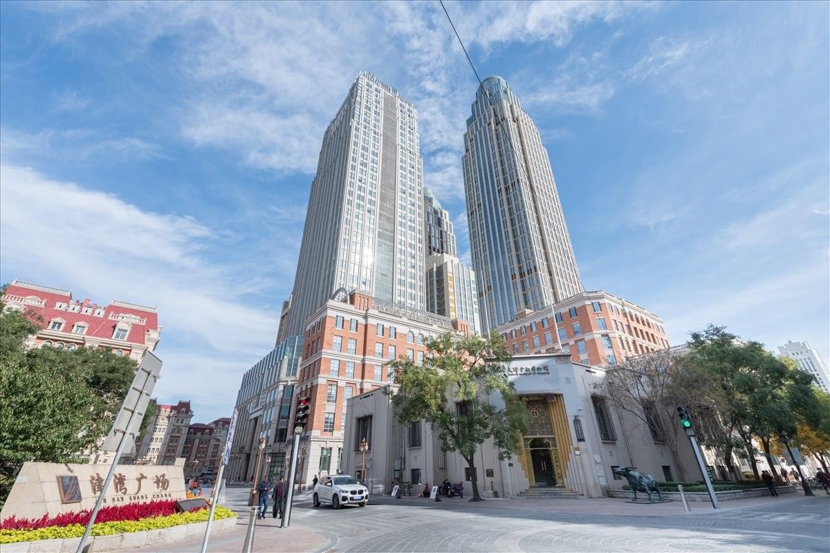 Exterior view of the towering glass Golden Valley Center skyscrapers.