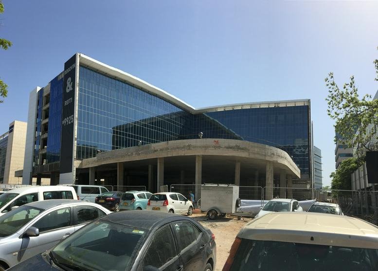 Exterior view of the glass-facade Hamanofim 10, Herzliya office building.