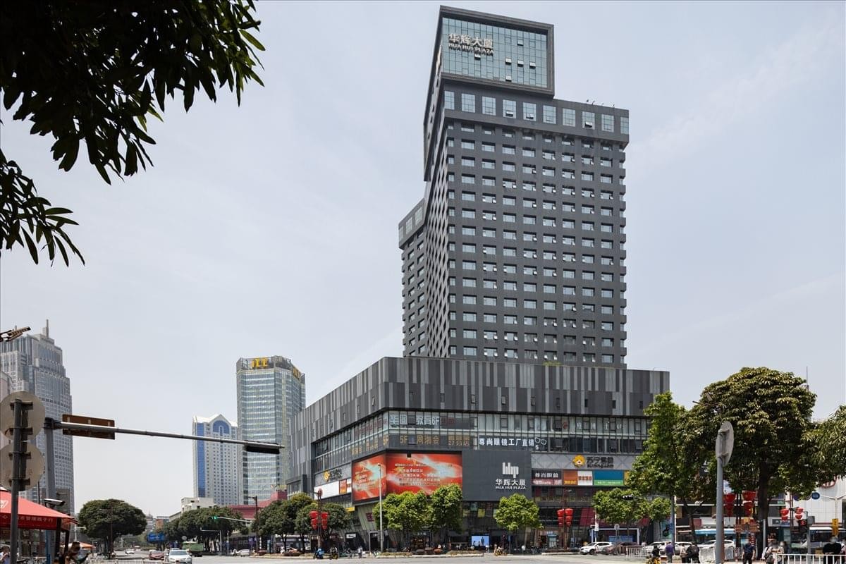 Exterior view of the Huahui Building, No. 46 Zumiao Road, featuring its modern high-rise facade.