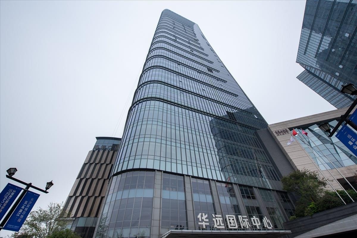 Exterior view of the towering glass facade of the Huayuan International Centre in Changsha.
