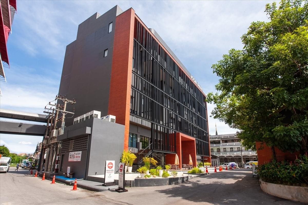 Exterior view of the contemporary dark-facade building at Icon Park Hotel.