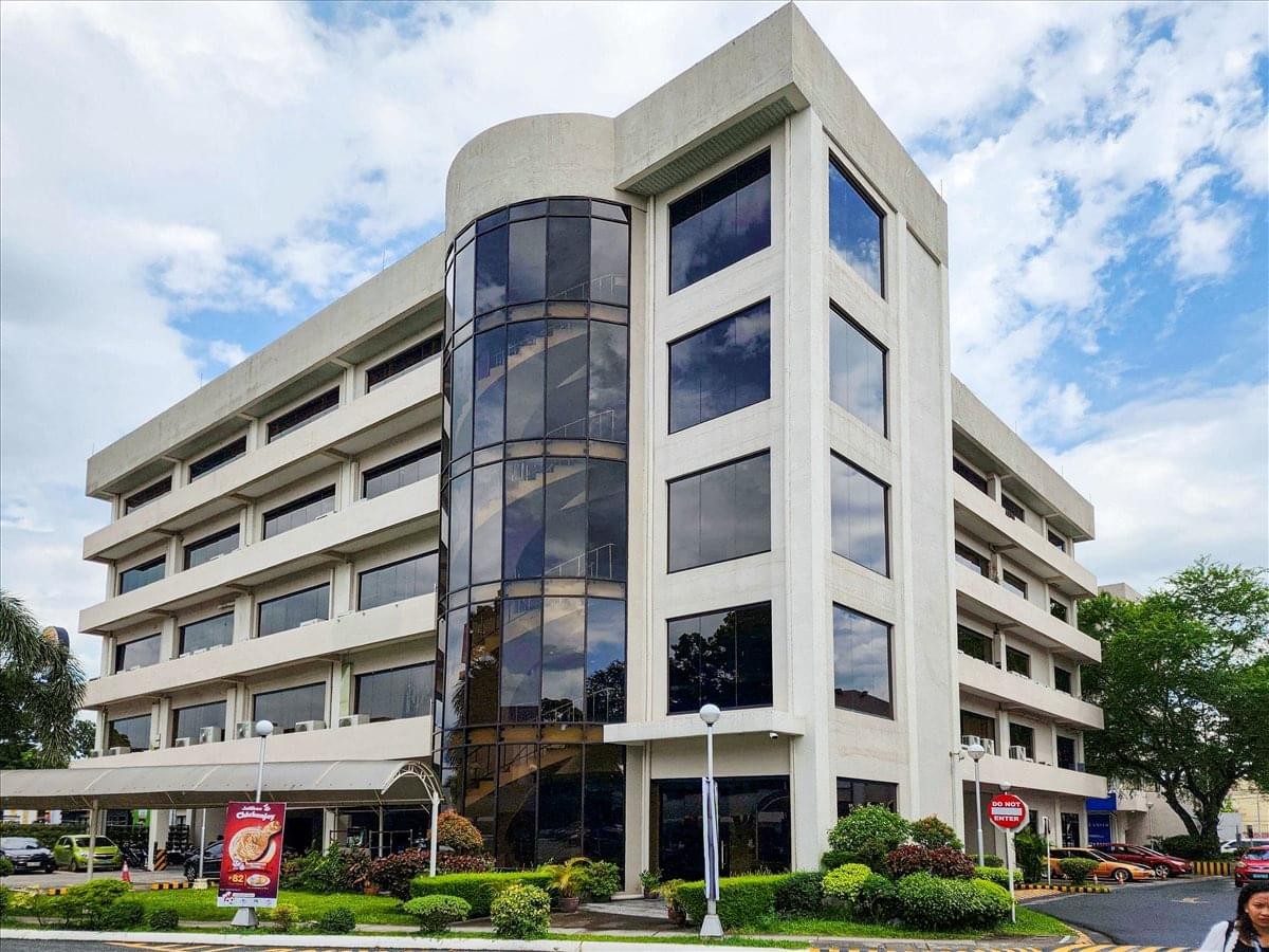 Exterior view of the multi-story glass and concrete 5th Clark Center 07 building.