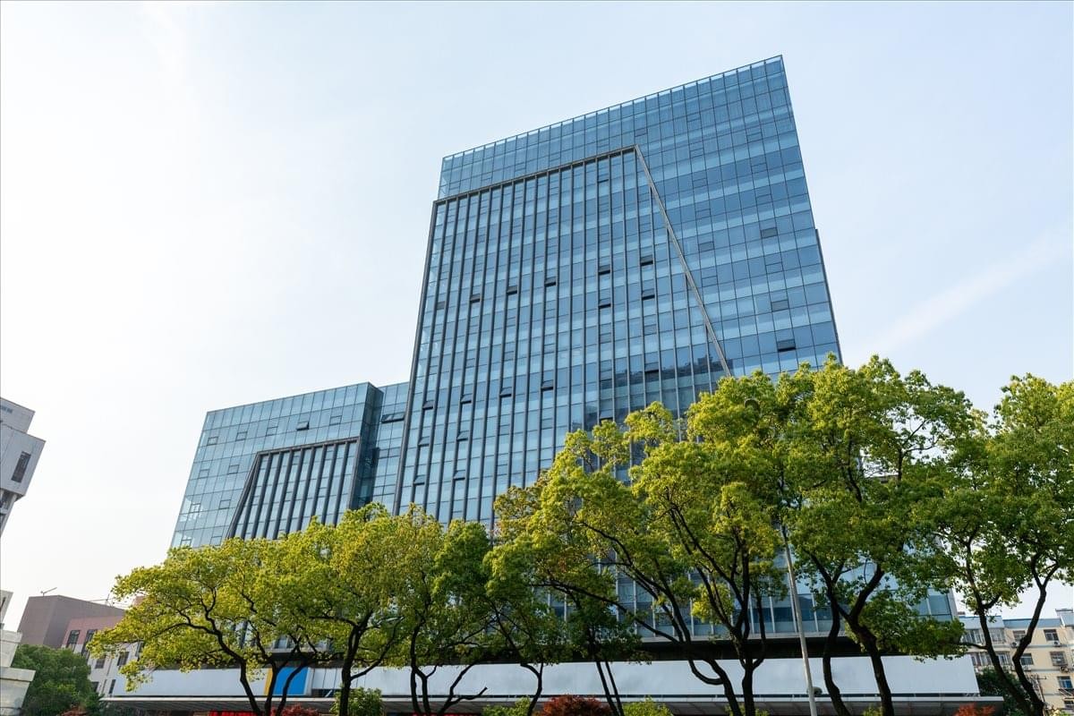 Exterior view of the contemporary glass facade at Kunshan ICC, No. 270 Qianjin Middle Road.