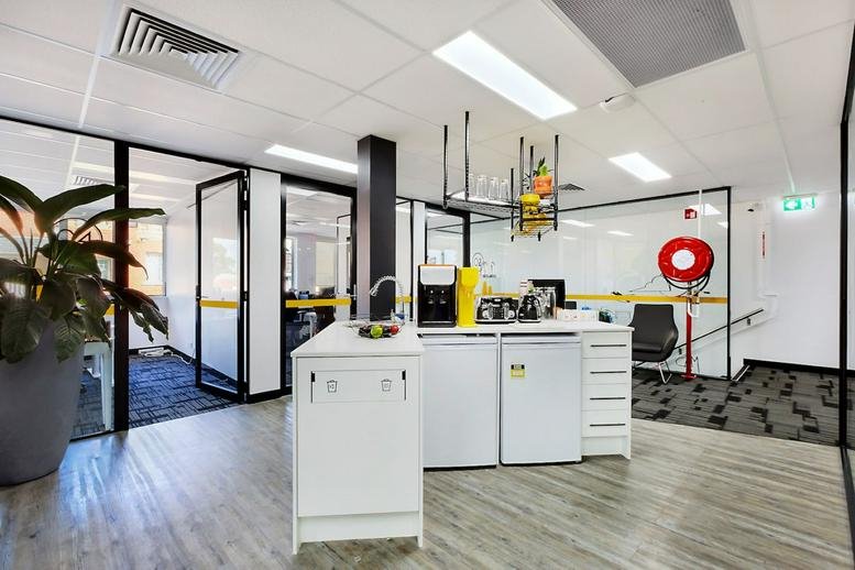 Spacious communal kitchen and breakout area at Level 1, 1401 Botany Road, Botany.