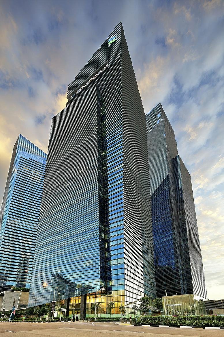 Exterior view of the iconic glass facade at Marina Bay Financial Centre Tower 1.