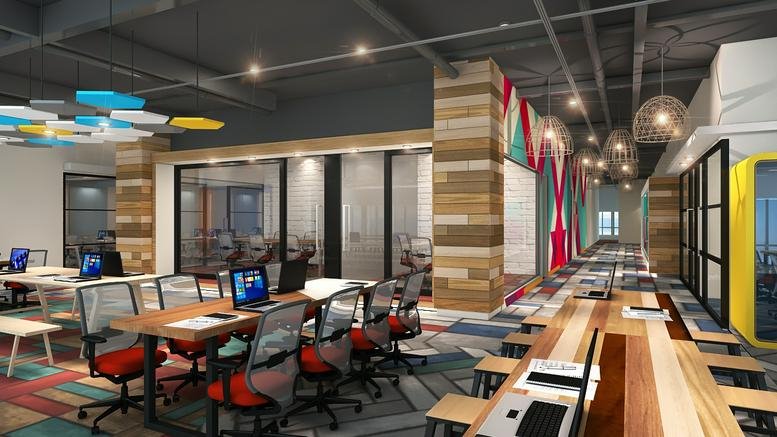 Spacious open-plan workspace at MATF Building, Gizri Road, Clifton, Karachi with wooden accents and modern lighting.