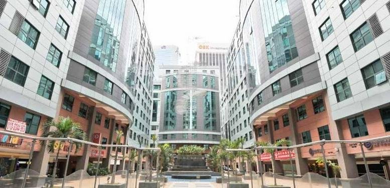 Exterior view of the multi-tower commercial complex at Megan Avenue I.