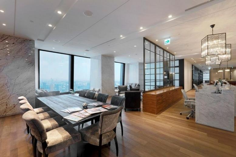 Spacious boardroom at Nanshan Plaza with large windows overlooking the city skyline.