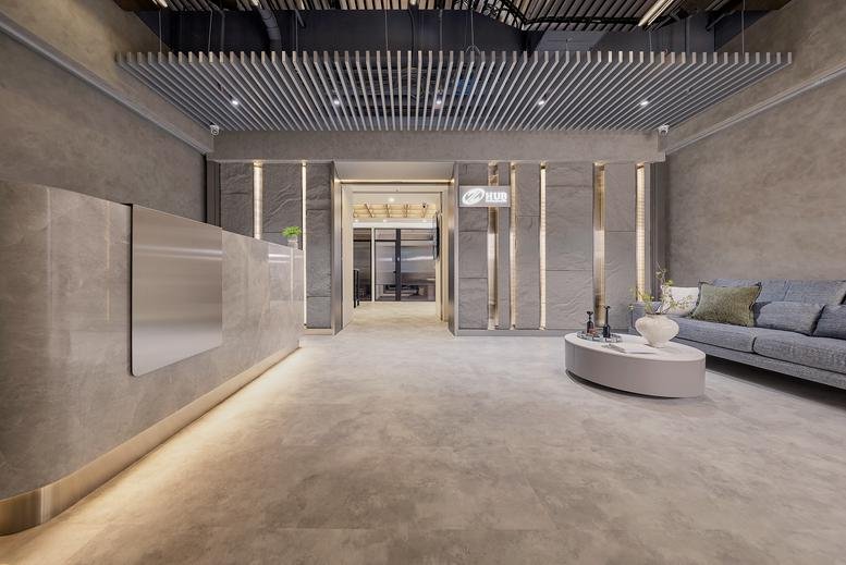 Wide-angle view of the lobby area at No. 167 Sec. 1 Fuxing S. Rd. featuring modern grey finishes.