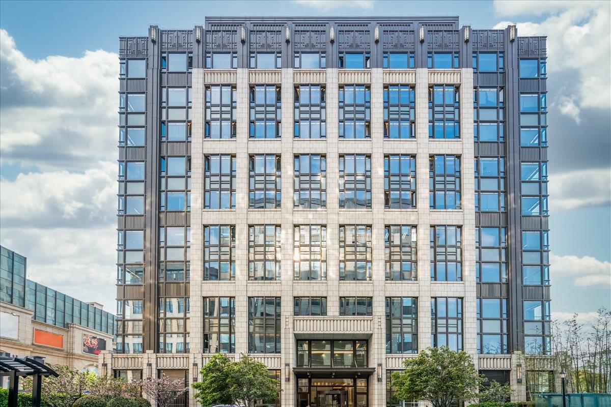 Exterior view of the grand multi-story Office Tower C at Chamtime Plaza Lane 2889.