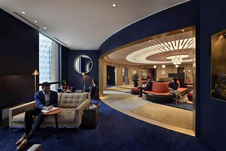 Spacious lounge at Parkview Square, 600 North Bridge Road, Singapore with blue walls and plush seating.