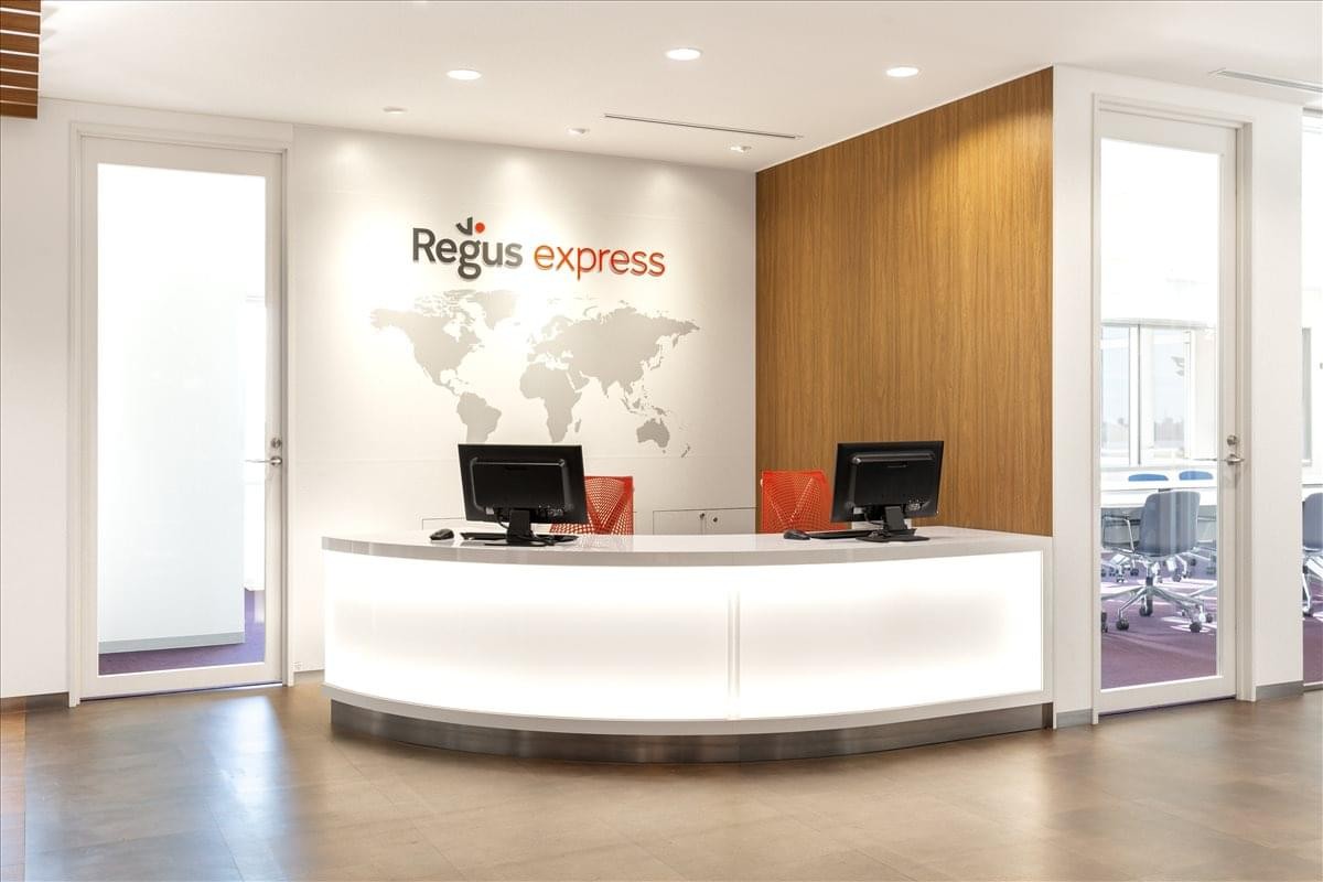 The bright, modern lobby and reception desk at Passenger Terminal 1, Haneda Airport.