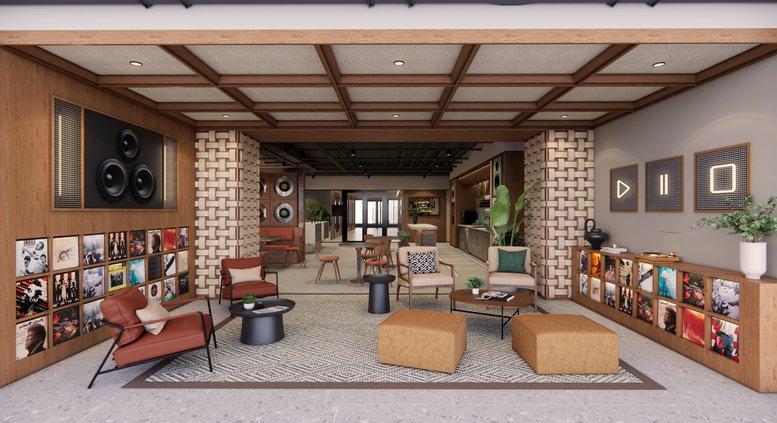 Mid-century modern lounge with record player theme and plush seating.