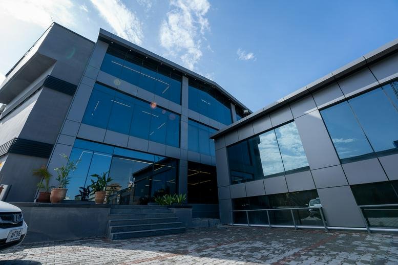 Exterior view of the modern glass-facade Daftarkhwan | North building.
