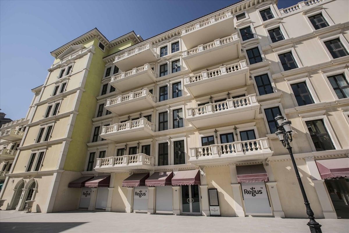 Exterior view of the classical facade at Qanat Quartier, QQ05A, Piazza Level, Units 93-99, The Pearl.