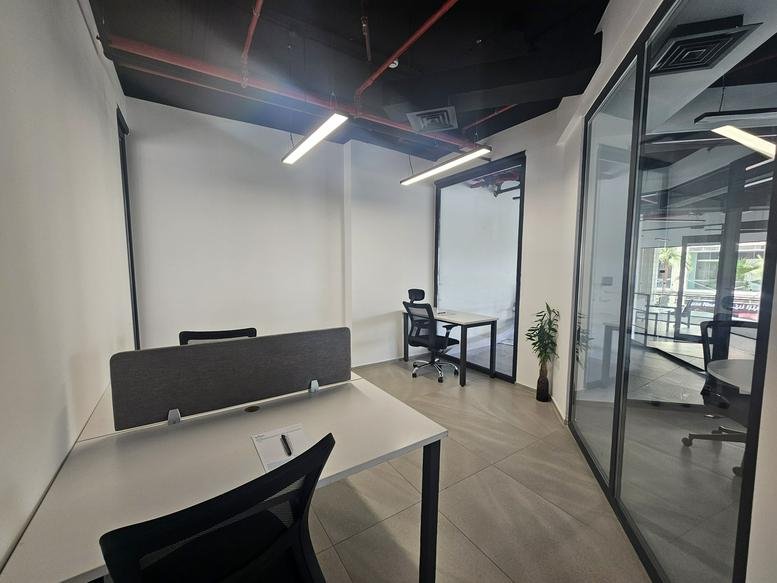 Modern glass-walled office at V Business Center, Rafiq Al Hariri Avenue, Abdali, Amman, Jordan.