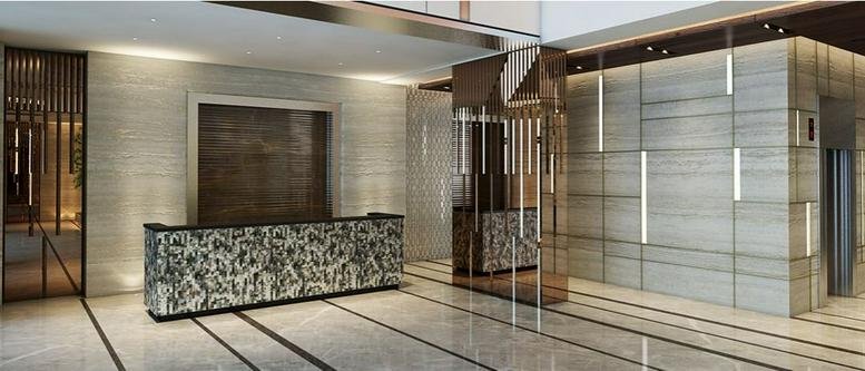 Reception area at Raheja Chambers, Free Press Journal Road, Nariman Point, Mumbai with a textured marble desk.