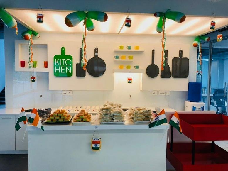 Catering area with snacks and Indian flags at Redbrick House, N. T. R Pride Building.