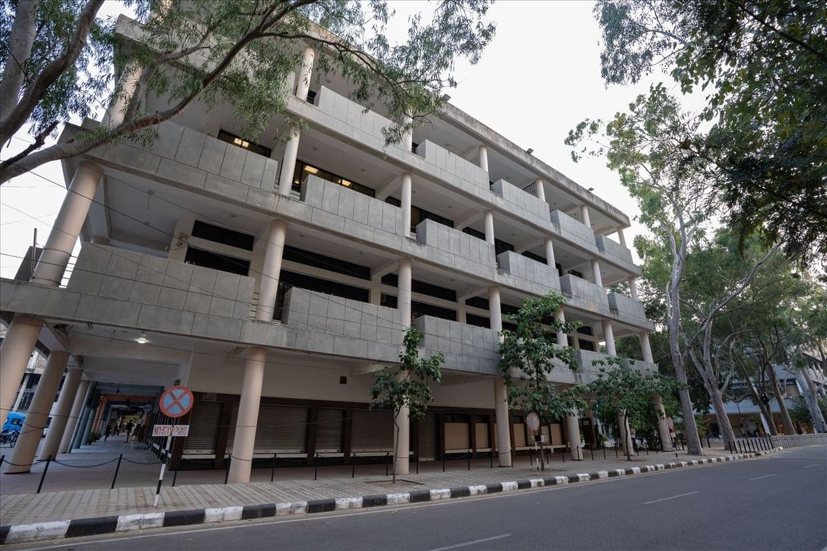 Exterior view of the concrete multi-story building at SCO 54-55-56, Sector 17 A, Chandigarh.