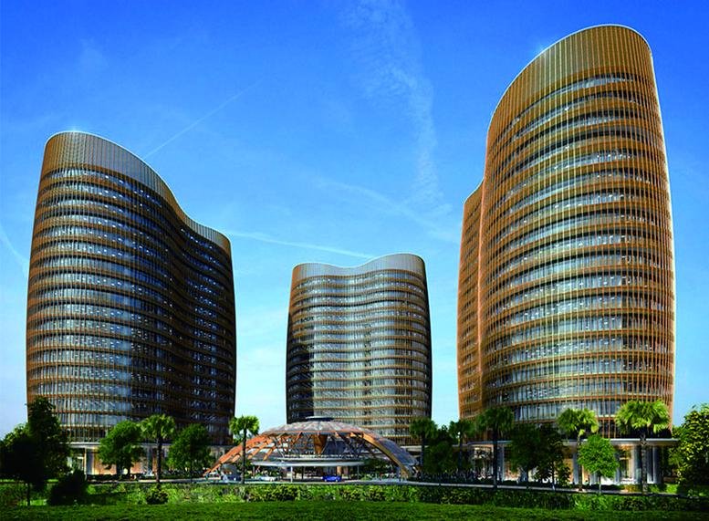 Exterior view of the wave-shaped glass facade towers at South Quarter, Tower A.