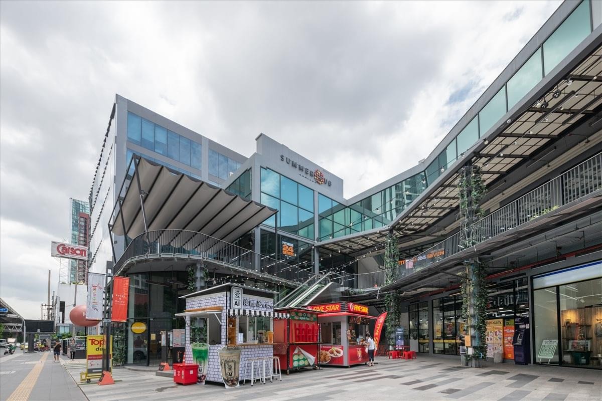 Modern exterior view of the multi-level glass building at Summer Hill, 1106 Sukhumvit Road.
