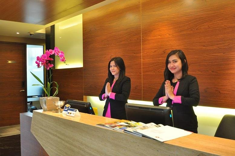 Professional reception desk at The CEO Building, Jl TB Simatupang with friendly staff in uniform.