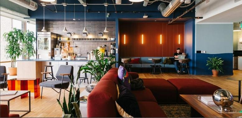 Spacious communal lounge at Tower B, 838 S. Huangpi Road, Huangpu District, Shanghai with a kitchen and plush seating.
