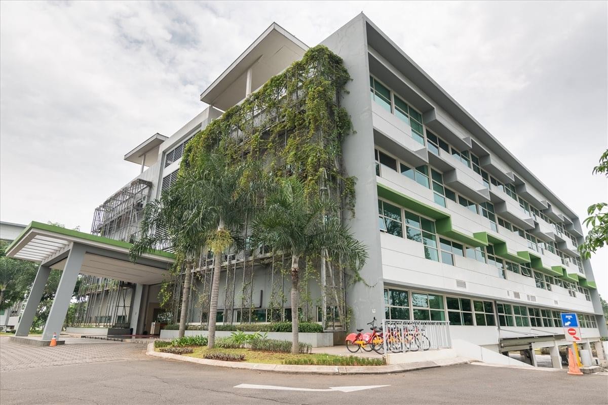 Exterior facade of Tower II 2nd Floor, Jl. Boulevard Gading Serpong Blok 0/2 with lush green vertical gardens.