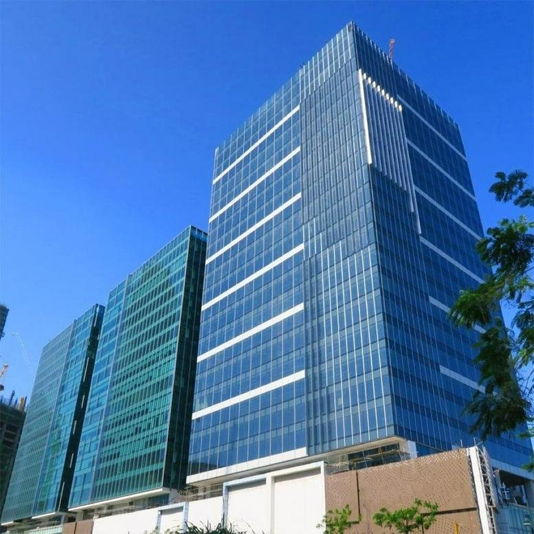 Exterior view of the modern glass-facade Uptown Bonifacio Tower Three in Taguig.